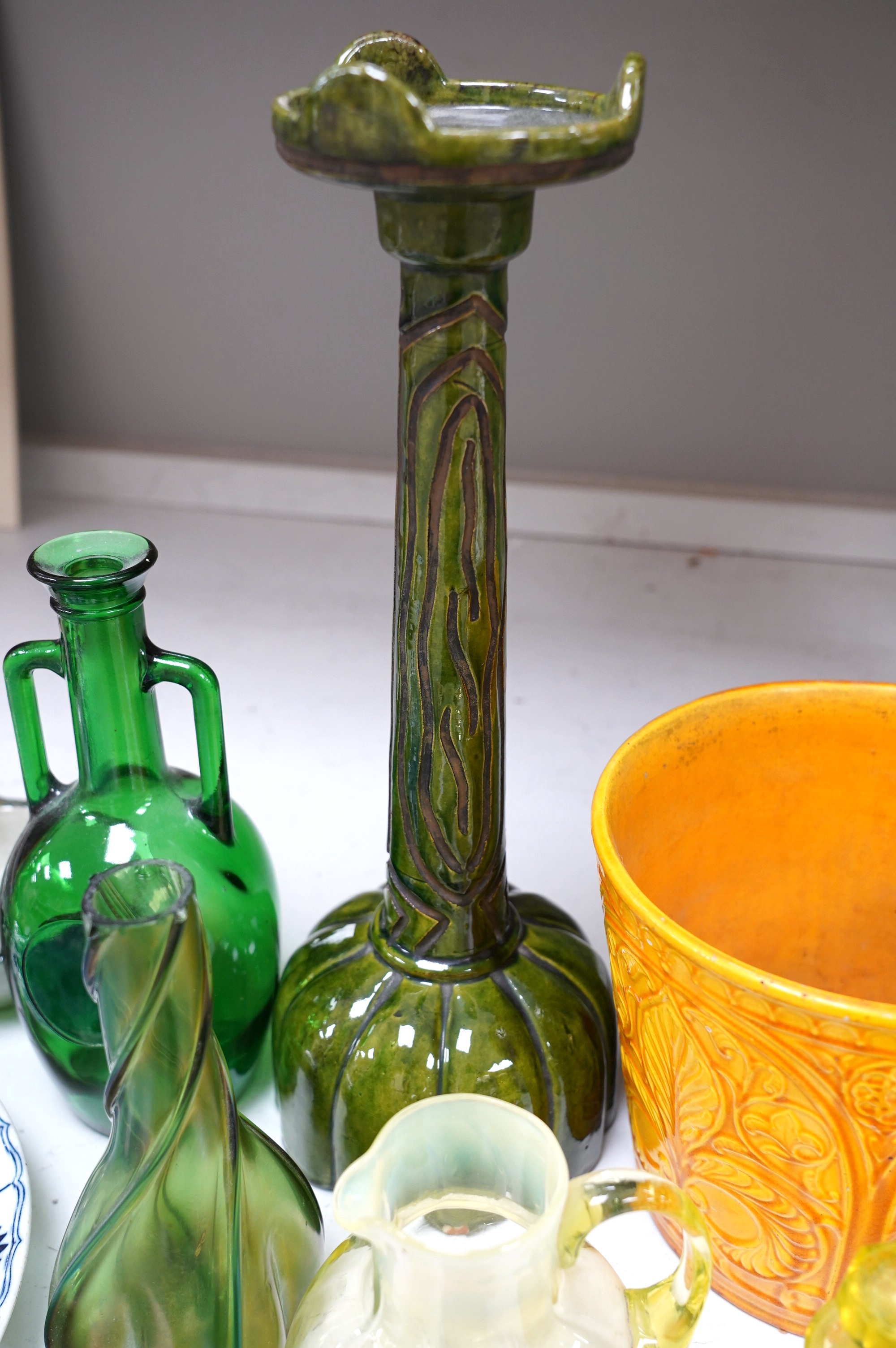 A collection of coloured glassware to include Vaseline examples and a collection of pottery to include a candlestick, a dish and a planter, largest 38cm (10). Condition - mostly fair